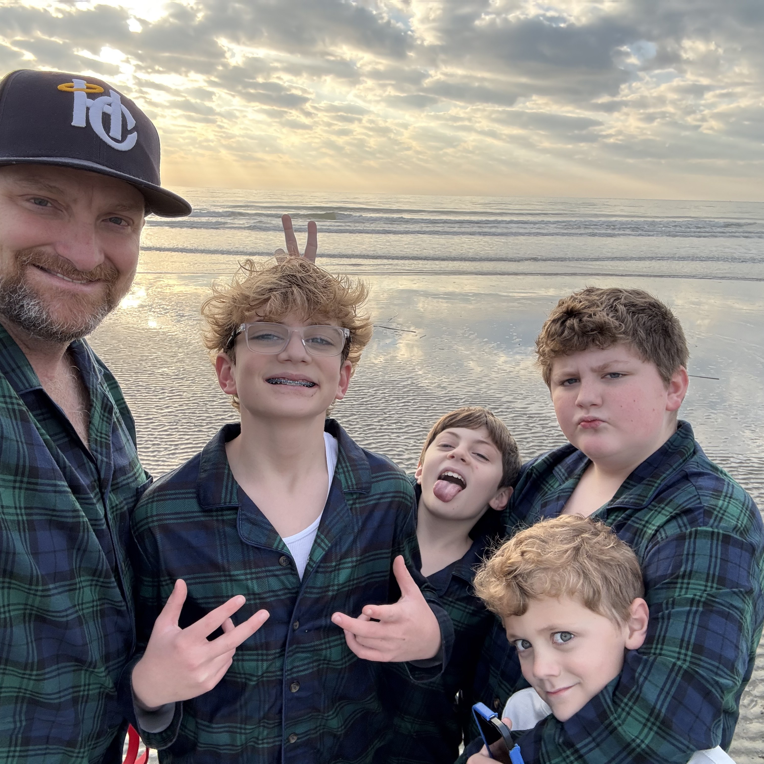Dr. Olendorf with his sons at the beach